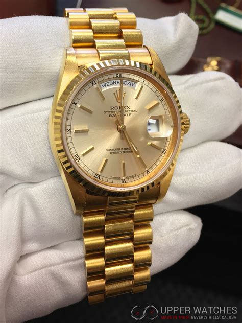 Rolex presidential day date gold